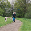 video of woman walking her dog